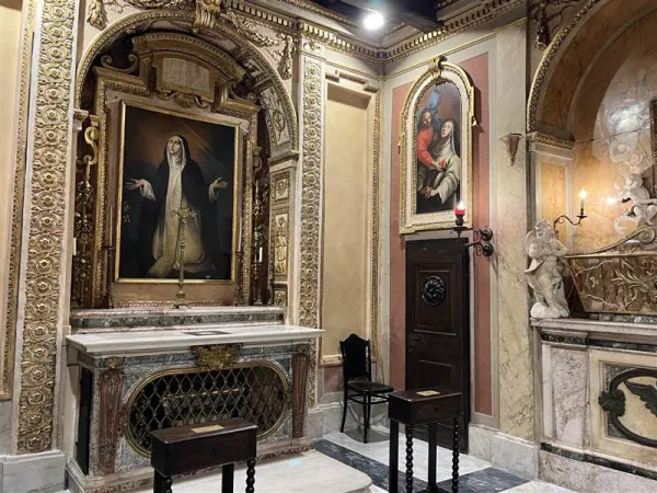 The building where St. Catherine lived in Rome with some of her followers has been replaced with a theater, the Opera Lirica di Roma. Hidden inside the theater building is a little gilded chapel dedicated to St. Catherine that marks the spot where she died in Rome. Credit: Courtney Mares/CNA