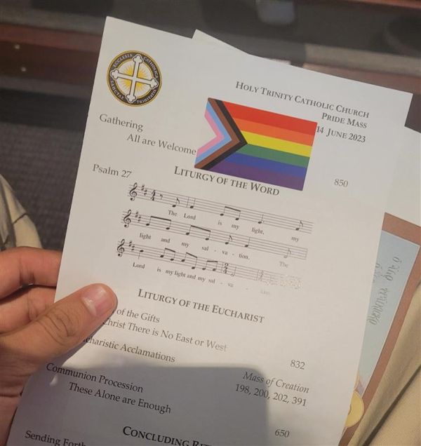 Mass program distributed by organizers of the D.C. "Pride Mass" prominently featured a "Progress Pride" flag. Peter Pinedo/CNA
