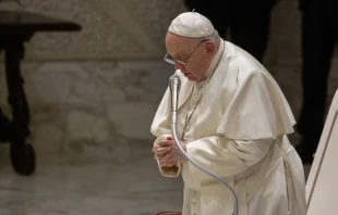 Pope Francis prays during his general audience address in the Paul VI Audience Hall at the Vatican on Dec. 27, 2023. Credit: Vatican Media