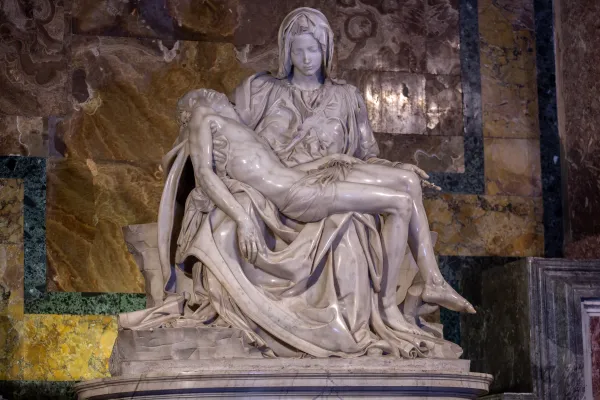Michelangelo's Pieta conveys the faith and emotion of the Blessed Virgin Mary as she cradles in her arms the dead body of her only son after witnessing him crucified. Daniel Ibañez/CNA