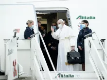 Pope Francis boards the papal plane before a visit to Iraq March 5, 2021.
