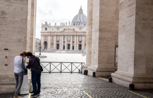 People use hand sanitizer before entering St. Peter's Basilica. Daniel Ibanez/CNA