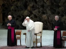 Pope Francis prays at his General Audience in the Vatican's Paul VI Hall, Feb. 2, 2022.