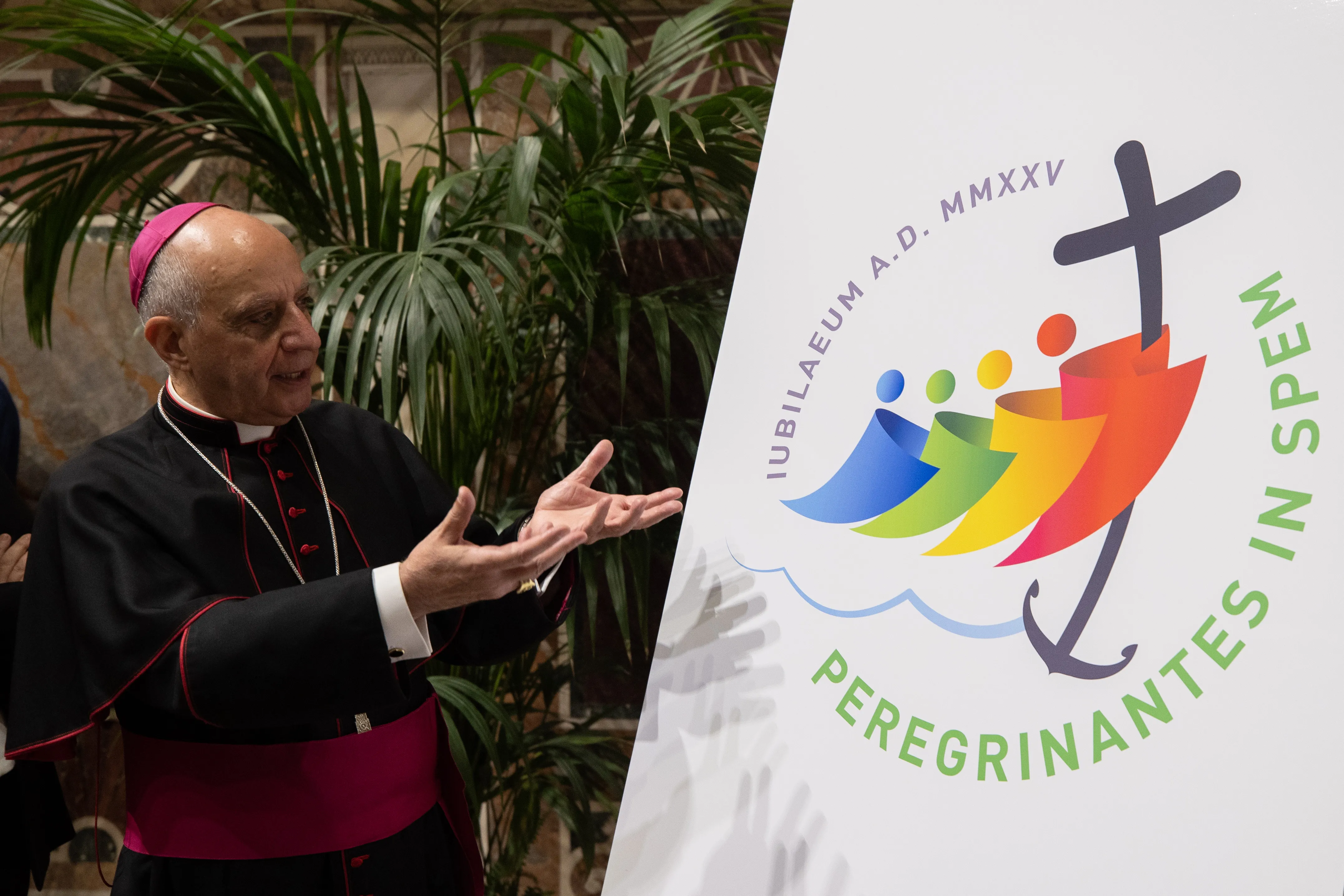Archbishop Rino Fisichella, pro-prefect of the Dicastery for Evangelization, presents the logo for the 2025 Jubilee Year, June 28, 2022.?w=200&h=150
