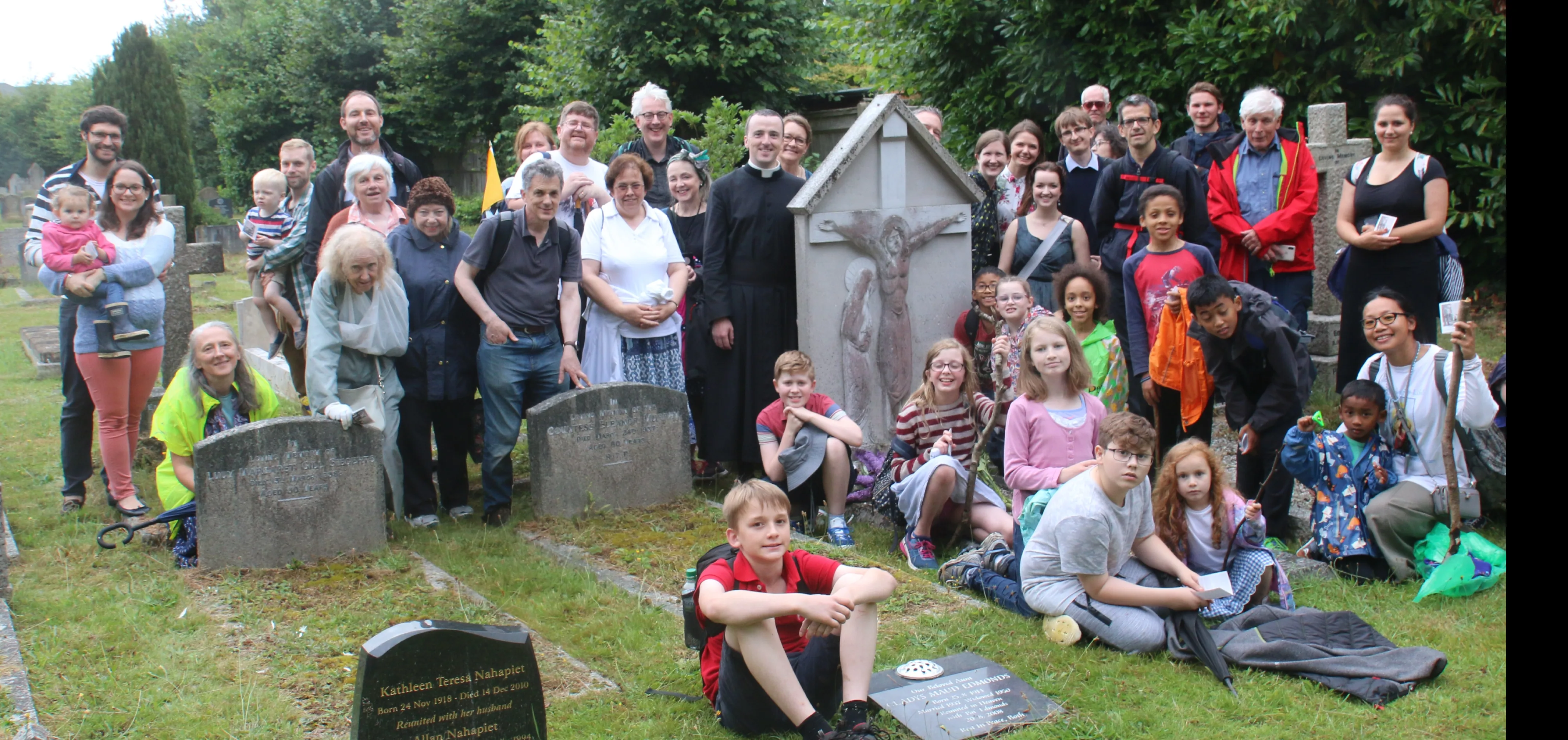 Pilgrims gather around Chesterton’s grave at Beaconsfield during July 25, 2020 pilgrimage?w=200&h=150