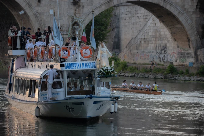 A floating procession of Our Lady of Mount Carmel on a boat in Rome’s Tiber River on July 24, 2022.