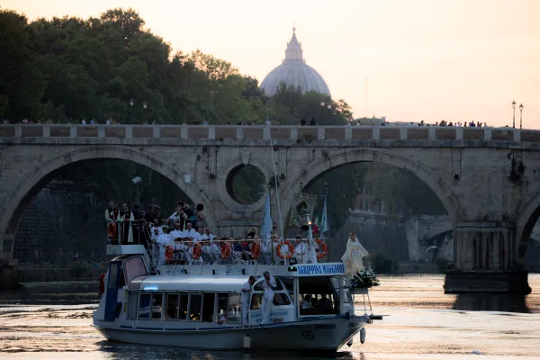 A floating procession of Our Lady of Mount Carmel on a boat in Rome’s Tiber River on July 24, 2022. Daniel Ibáñez/CNA