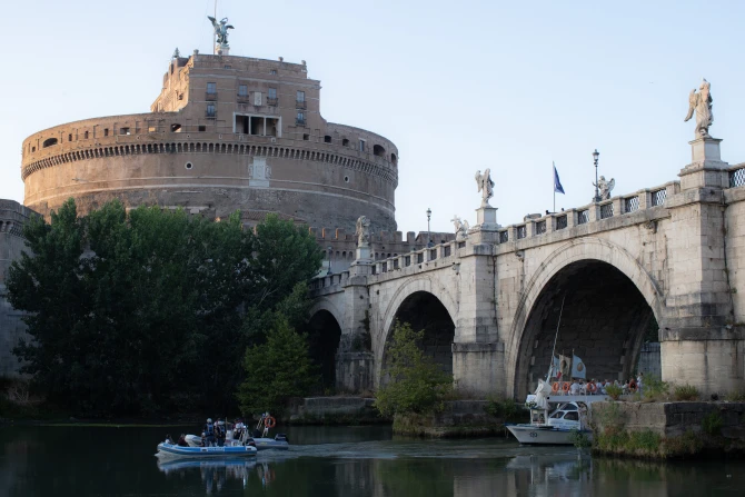 A floating procession of Our Lady of Mount Carmel on a boat in Rome’s Tiber River on July 24, 2022.