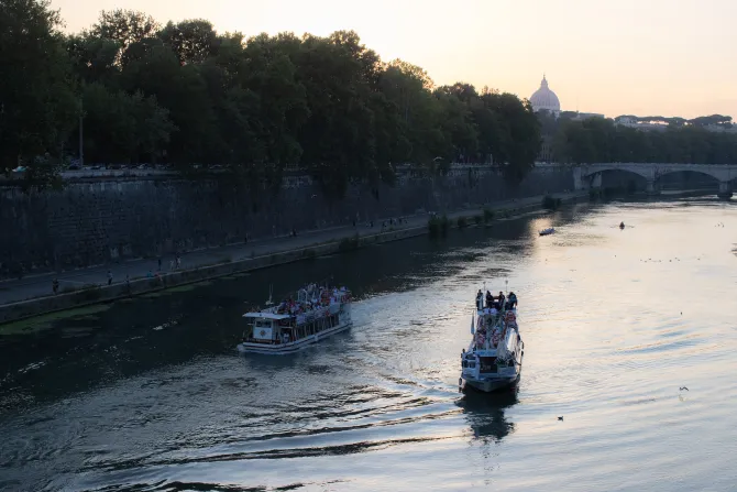 A floating procession of Our Lady of Mount Carmel on a boat in Rome’s Tiber River on July 24, 2022.