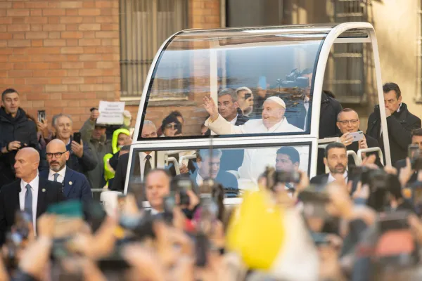 Pope Francis waves at people outside the Asti Cathedral before celebrating Mass for the Solemnity of Christ the King on Nov. 20, 2022. Credit: Daniel Ibanez/CNA