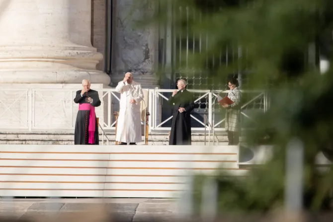 Pope Francis praying at the general audience on St. Peter's Square