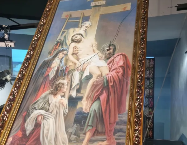 At the center of the exhibition "Ukraine Crucified" in Kyiv is a painting of Jesus, salvaged from a church shelled by the Russians. Andrea Gagliarducci / CNA