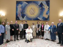 Pope Francis meets members of the Global Solidarity Fund in a room adjacent to the Vatican’s Paul VI Hall, May 25, 2022.