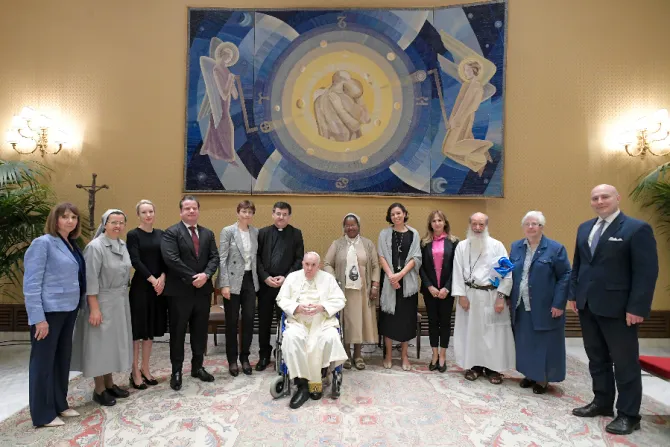 Pope Francis meets members of the Global Solidarity Fund in a room adjacent to the Vatican’s Paul VI Hall, May 25, 2022
