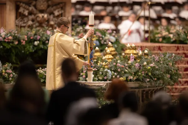 St. Peter's Basilica was decorated with many colorful flowers for the Easter Vigil Mass on April 8, 2023. Daniel Ibanez/CNA