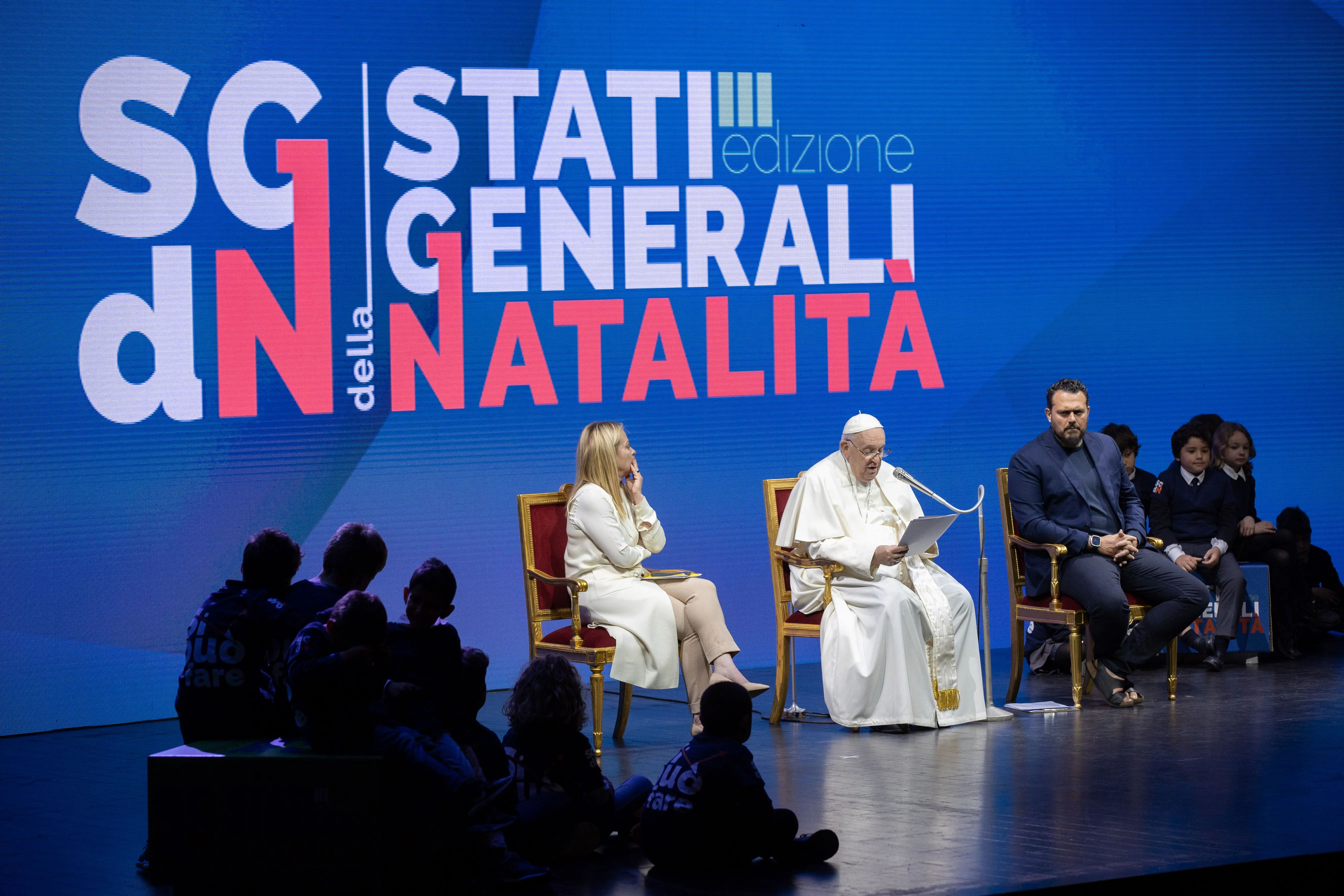 Pope Francis shared a stage with Italy's Prime Minister Giorgia Meloni on May 12, 2023, to speak at a two-day conference on “The General State of the Birth Rate,” held at Conciliazione Auditorium close to the Vatican.?w=200&h=150