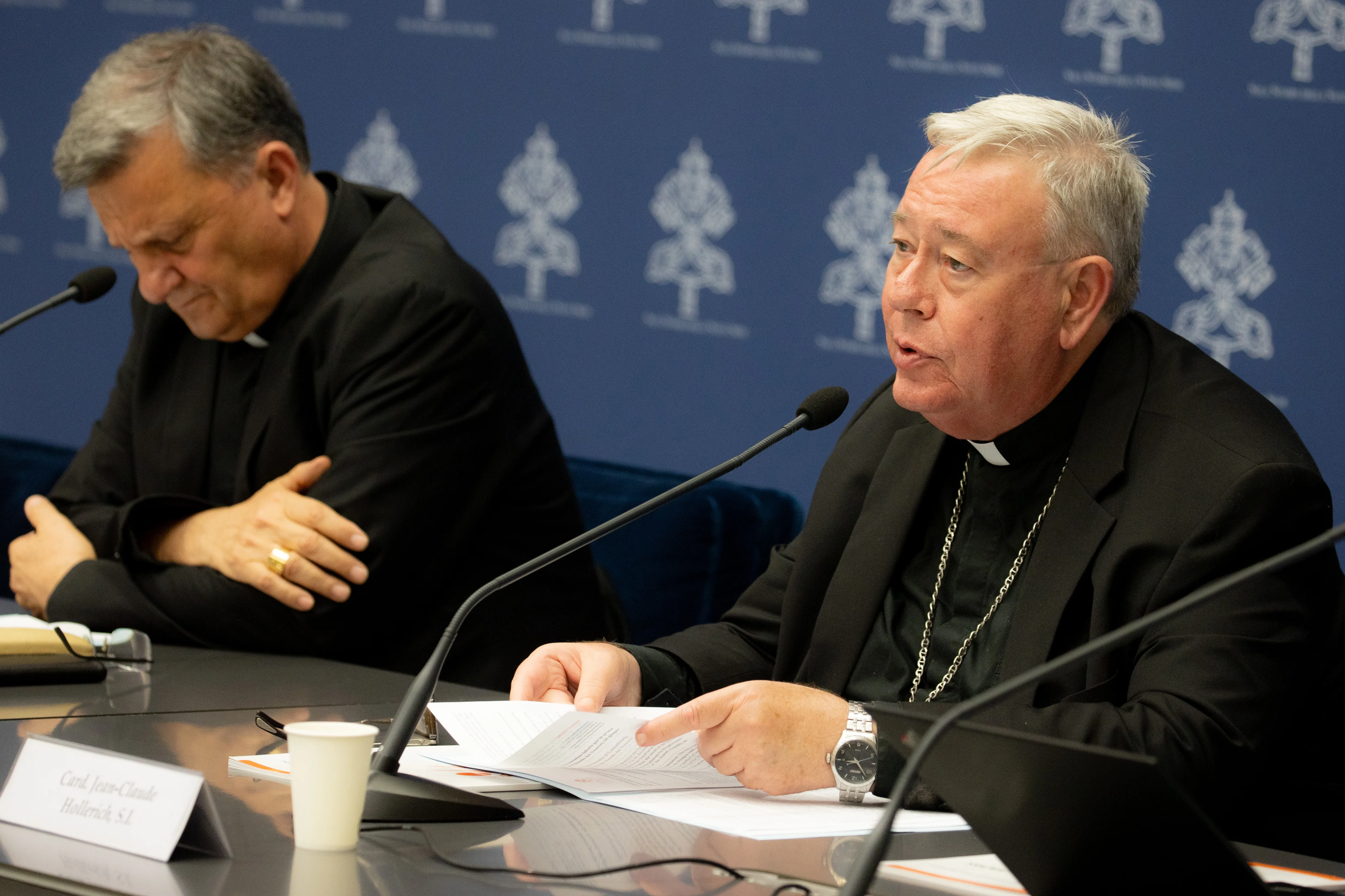 Cardinal Jean-Claude Hollerich (right), relator general of Synod on Synodality, speaks to the media on June 20, 2023, at the temporary headquarters of the Holy See Press Office in Vatican City. Beside him is Cardinal Mario Grech, the Secretary General for the Synod of Bishops.?w=200&h=150