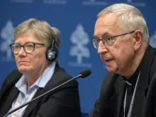Catherine Clifford, a professor at St. Paul University in Ottawa, and Archbishop Stanisław Gadecki of Poland at the Synod on Synodality's Oct. 26, 2023, press briefing.