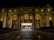 There was a candlelit path to the altar holding the Eucharist during adoration in St. Peter's Square on March 14, 2023.