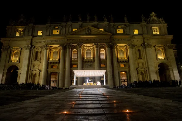 There was a candlelit path to the altar holding the Eucharist during adoration in St. Peter's Square March 14, 2023. Daniel Ibanez/CNA
