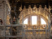 Workers at the baldacchino in St. Peter’s Basilica.