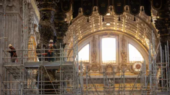 Workers at the baldacchino in St. Peter’s Basilica.