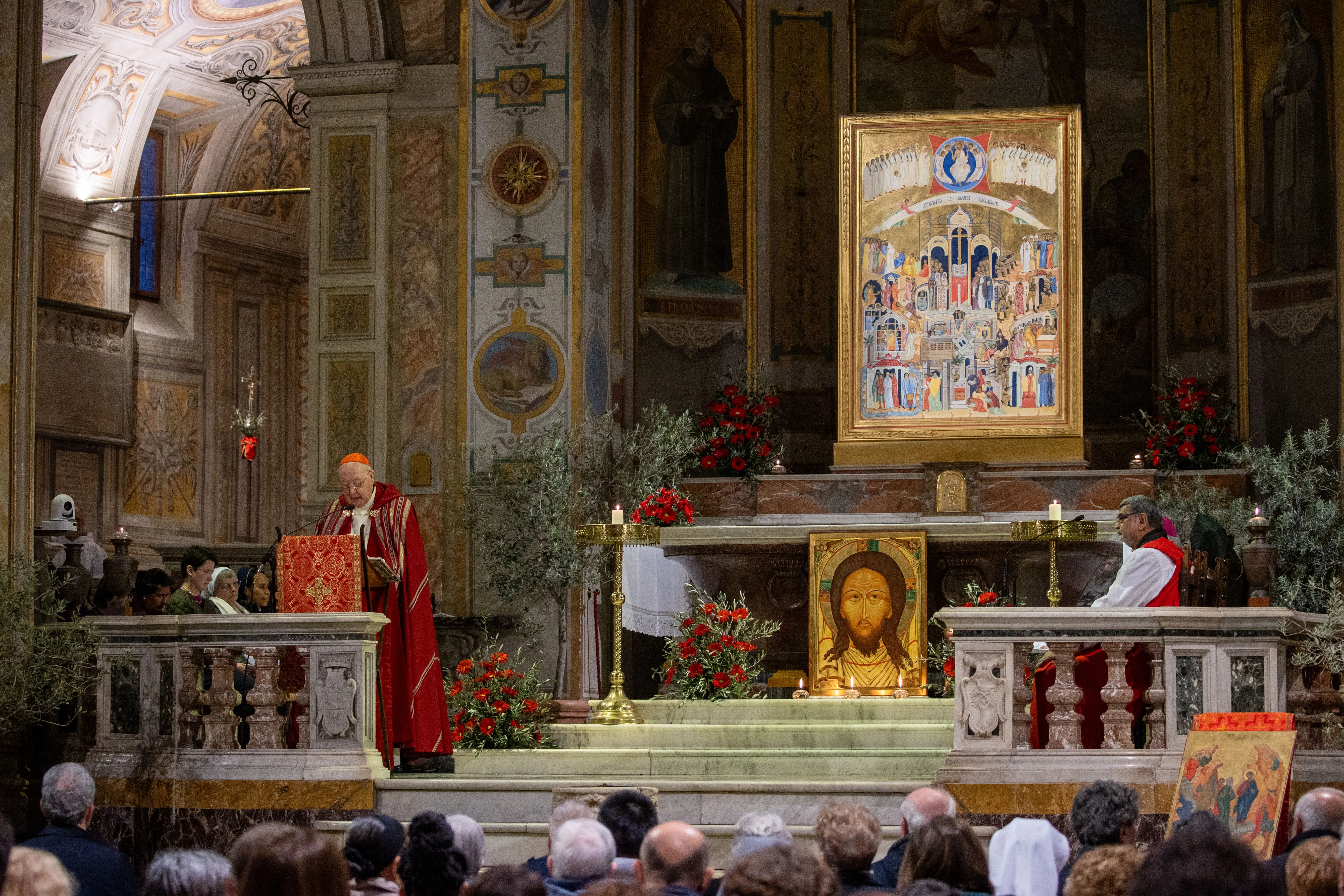 Catholics gather in Rome’s Basilica of St. Bartholomew on Tiber Island on Holy Tuesday, March 26, 2024, for a prayer vigil honoring Christians who have been killed for their faith in recent years.?w=200&h=150