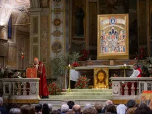Catholics gather in Rome’s Basilica of St. Bartholomew on Tiber Island on Holy Tuesday, March 26, 2024, for a prayer vigil honoring Christians who have been killed for their faith in recent years.