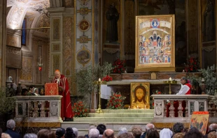 Catholics gather in Rome’s Basilica of St. Bartholomew on Tiber Island on Holy Tuesday, March 26, 2024, for a prayer vigil honoring Christians who have been killed for their faith in recent years. Credit: Daniel Ibañez/CNA