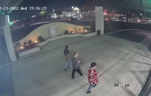 Photo taken from surveillance footage shows suspect (center) with two other individuals just prior to a vandalism incident at Holy Family Catholic Church in Jacksonville, Florida, on Feb. 23, 2022. Courtesy of Father David Keegan