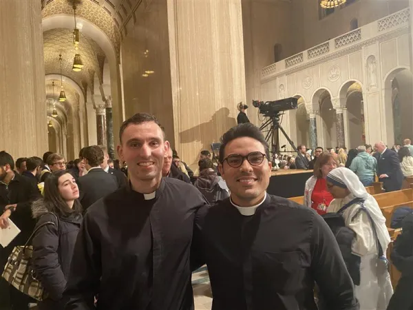 Boston seminarians Sean McKeown (left) and Thiago Mesquita (right) after an eight-hour train ride to attend the March for Life vigil and March on Friday. Credit: Photo by Joe Bukuras
