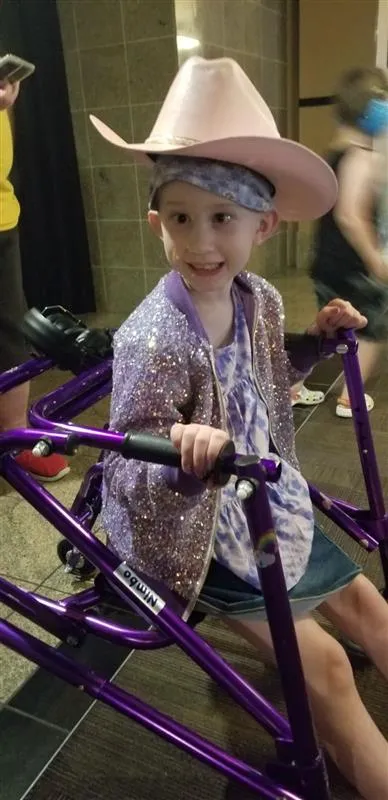 Mary Stegmueller, who has a rare form of cancer called Diffuse Intrinsic Pontine Giloma (DIPG), a the Luke Bryan concert at Ball Arena, in Denver on July 29, 2023. Photo credit: Kristin Stegmueller