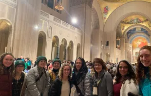 Sarah Achenbach (center left) and Heather Kramer (center right) traveled with other pilgrims from a pro-life Wisconsin group to the Vigil Mass for Life on Jan. 19, 2023, celebrated by Bishop Michael Burbidge of Arlington, Virginia, at the Basilica of the National Shrine of the Immaculate Conception in Washington, D.C. Lauretta Brown/CNA