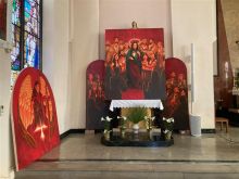 A triptych of Pentecost with Mary at the center in the Temple by Mattie Karr at Holy Name Parish in Kansas City, Kansas.