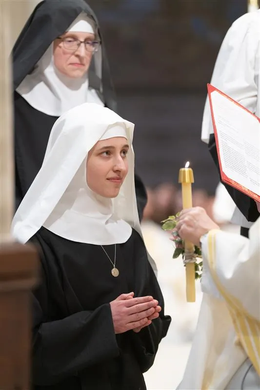 Sister Lucia Rose receives the holy habit of religion in a ceremony called investiture, and thereupon enters the novitiate on Jan. 6, 2024, the feast of the Epiphany. Credit: Deborah Kates Photography