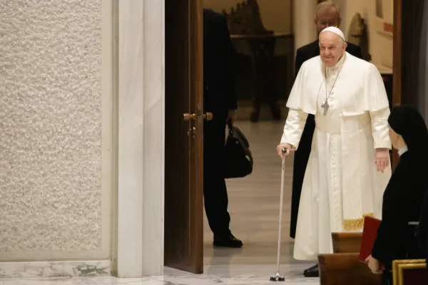 Pope Francis uses a cane to enter Paul VI Hall at the Vatican for his general audience Dec. 20, 2023. Credit: Elizabeth Alva/EWTN