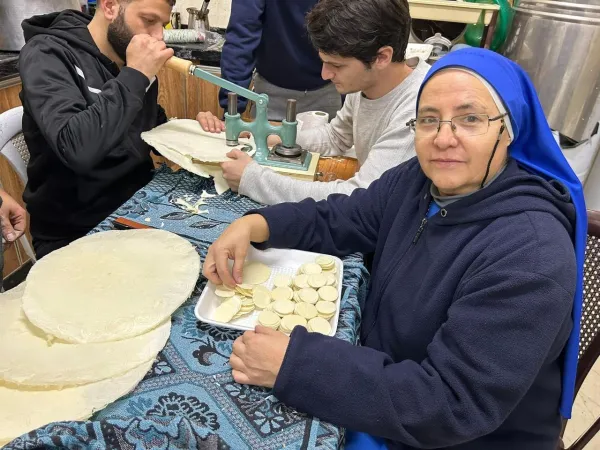 A religious sister in northern Gaza assists with the making of hosts being prepared in a makeshift “factory” since no supplies are coming from the outside. Credit: Father Gabriel Romanelli/Facebook