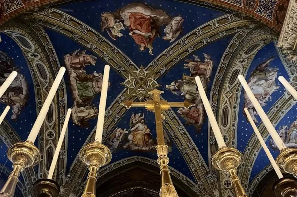 Located around the corner from the Pantheon, the tomb of St. Catherine of Siena sits within the high altar of the Basilica of Santa Maria Sopra Minerva under the striking blue and gold vaulted ceiling of Rome’s only church with a Gothic interior. Credit: Courtney Mares/CNA