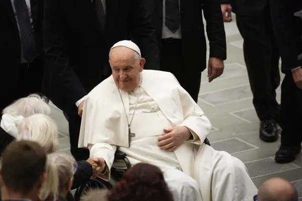 Pope Francis greets pilgrims at his general audience Dec. 13, 2023, in Paul VI Hall at the Vatican. Credit: Elizabeth Alva/EWTN