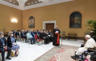 Pope Francis meets participants in the international conference ‘Lines of Development of the Global Compact on Education’ in a room adjacent to the Vatican's Paul VI Hall, June 1, 2022. Vatican Media.