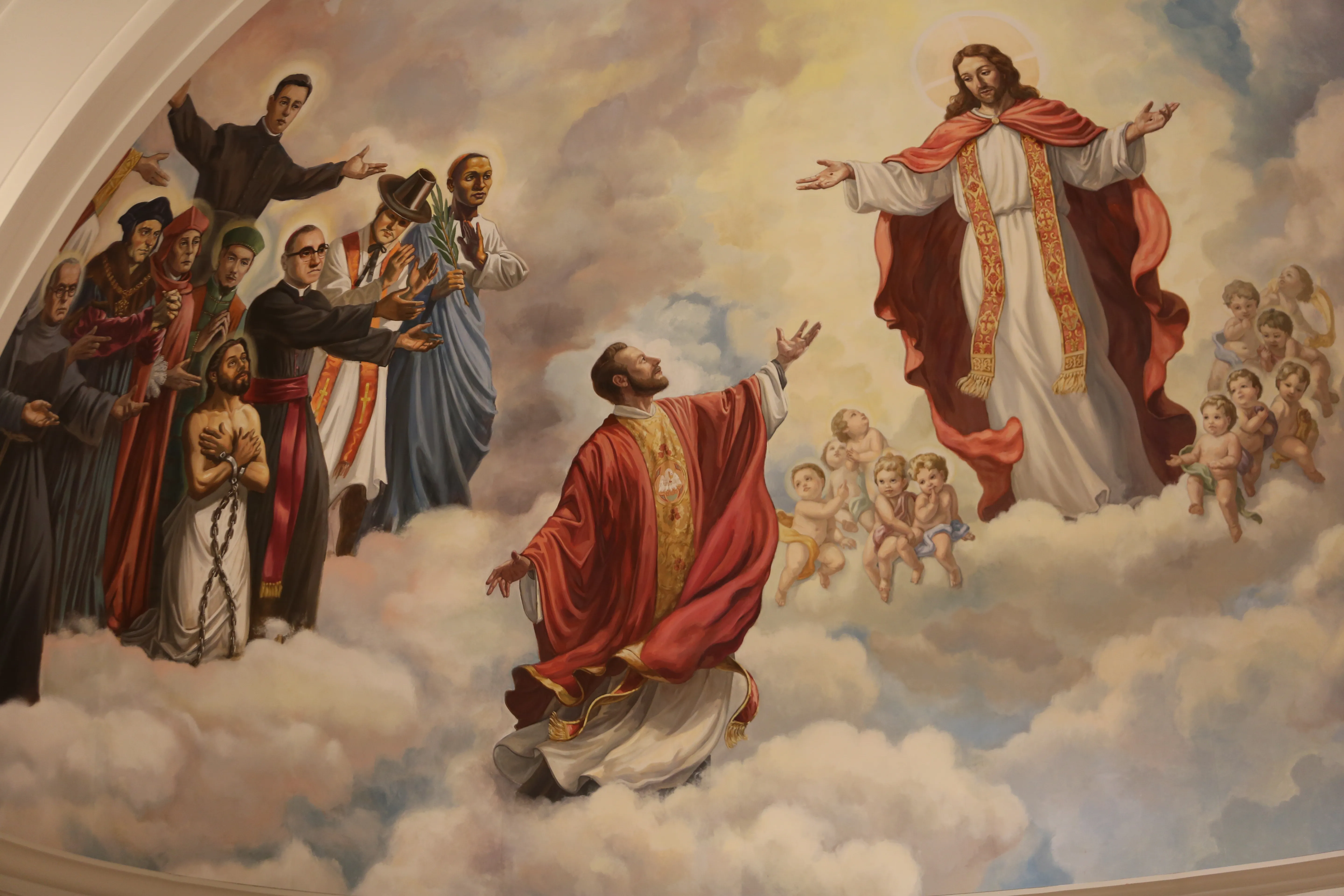 Detail of a mural showing Blessed Stanley Rother being welcomed into heaven at the new Blessed Stanley Rother Shrine in Oklahoma City.?w=200&h=150