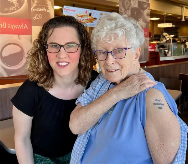 Amanda Achtman pictured with Christine, an 88-year-old woman who got a tattoo that says “Don’t euthanize me,” which is featured in a short four-minute documentary. Credit; Photo courtesy of Amanda Achtman