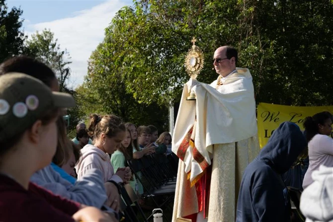 Eucharistic adoration at youth rally on St. Clements Island