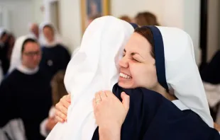 Two religious sisters in Sisters of Life embrace. Credit: Sisters of Life (photo by Martin Jernberg)