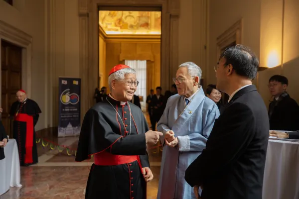 Cardinal Lazzaro You Heung-sik, prefect of Dicastery for the Clergy, speaks with Yu In-chon, minister of culture, sports, and tourism in South Korea, at a Dec. 11, 2023, reception marking the 60th anniversary of diplomatic relations between the Holy See and the Republic of Korea. Credit: Elizabeth Alva/EWTN