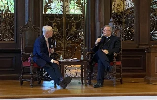 Winona-Rochester Bishop Robert Barron, with Deacon Tim O'Donnell to his left, answers questions from the crowd following his lecture "The Catholic Intellectual Tradition" on Harvard University's campus on Sept. 17, 2023. Credit: Joe Bukuras/CNA
