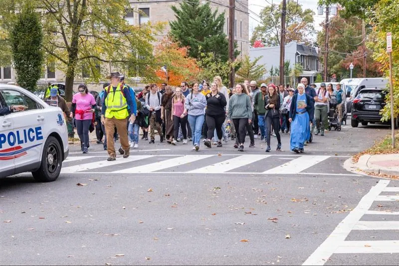 Pilgrims walk from Silver Spring, Maryland, to the St. John Paul II National Shrine on Saturday, Oct. 21, 2023, the day before his feast day.?w=200&h=150