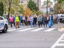 Pilgrims walk from Silver Spring, Maryland, to the St. John Paul II National Shrine on Saturday, Oct. 21, 2023, the day before his feast day.