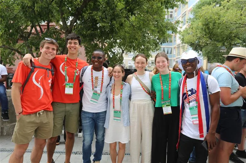 James Nyumah, 23, from Liberia, (pictured third from left) hangs out with new friends from Australia while attending a "Rise Up" session at World Youth Day 2023 in Lisbon, Portugal, on Aug. 2, 2023.?w=200&h=150