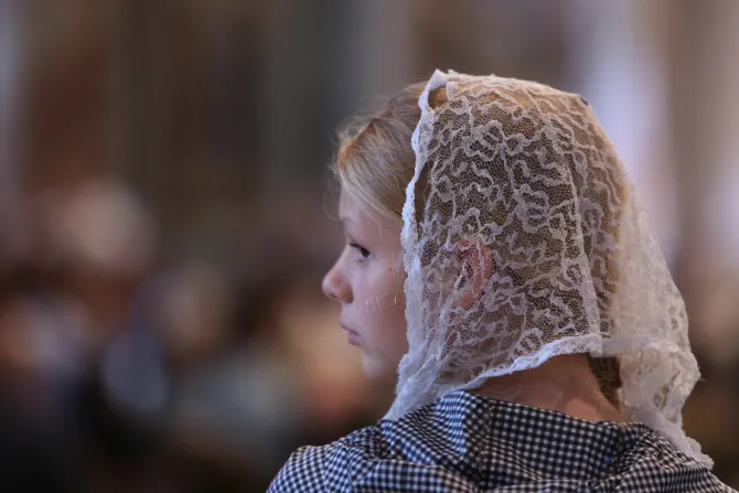 A girl with a chapel veil at the Summorum Pontificum Pilgrimage Mass in Rome on Oct. 25, 2014.
